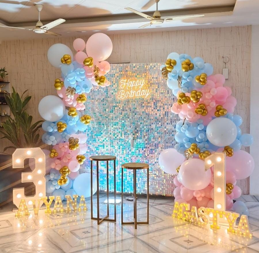 Completed sequin birthday stage with balloons and light-up numbers